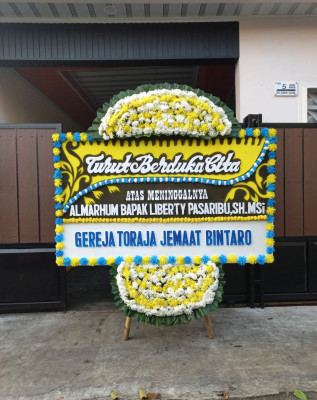 Papan Bunga Duka di Donokerto